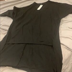 Black blouse, high low.